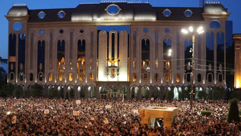 a rally in front of the Parliament building in Tbilisi on June 21, 2019