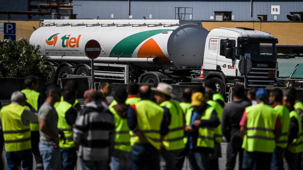 A tanker passes a picket line, 12 Aug 19