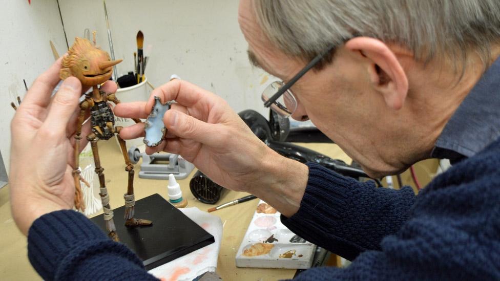 Pinocchio model and Peter Saunders in the Mackinnon and Saunders workshop