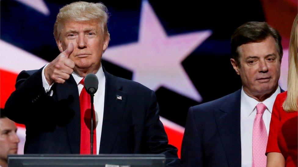 Republican presidential nominee Donald Trump gives a thumbs up as his campaign manager Paul Manafort looks on during Trump's walk through at the Republican National Convention in Cleveland, U.S., July 21, 2016. Picture taken July 21, 2016. REUTERS/Rick Wilking/File Photo/File Photo