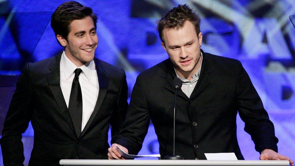 Actors Jake Gyllenhaal and Heath Ledger present a nominee plaque onstage during the 58th Annual Directors Guild Of America Awards held at Hyatt Regency Century Plaza on January 28, 2006 in Los Angeles, California