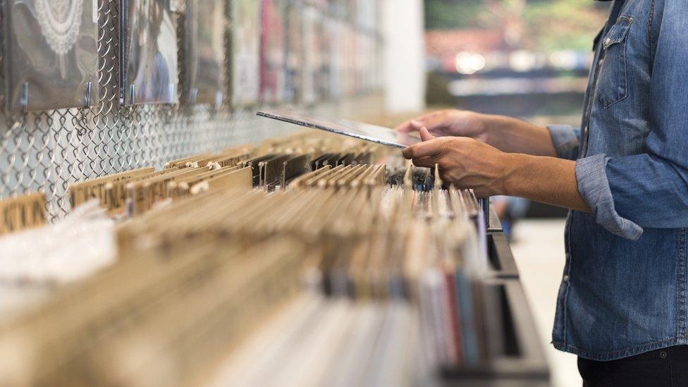 Man browsing music