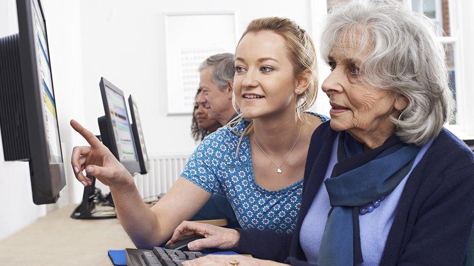 Young and old look at computers