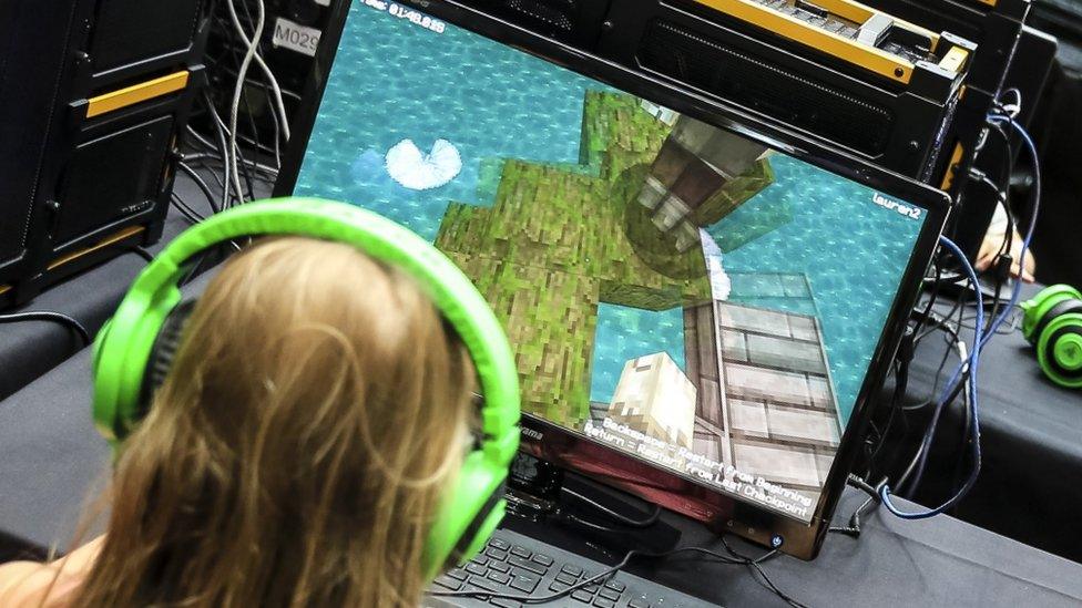 Girl playing Minecraft