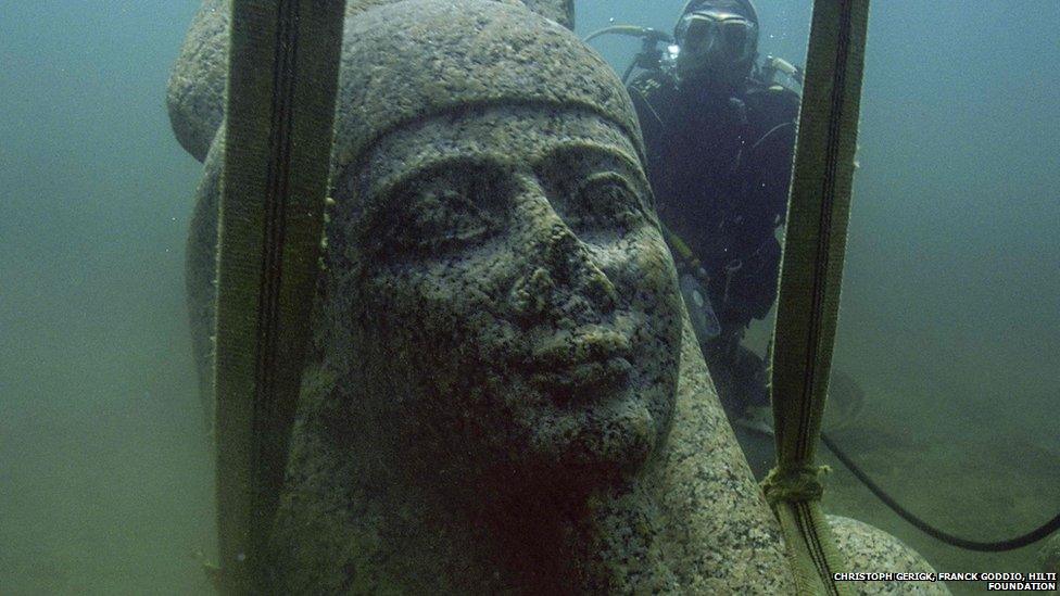 By the 8th century AD, the sea had reclaimed the cities of Thonis-Heracleion and Canopus and they lay hidden below the seabed for centuries. This smiling statue being hoisted from the sea bed is the god Hapy who symbolised the flooding of the Nile.