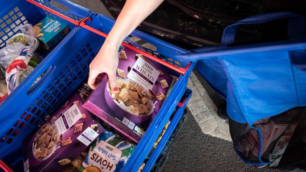 Tesco groceries packed in baskets for delivery