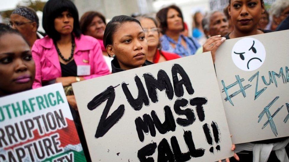 Demonstrators protest against South African President Jacob Zuma's firing of Finance Minister Pravin Gordhan