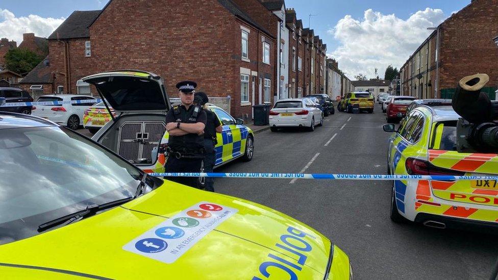 Police at the scene of the siege in Tamworth