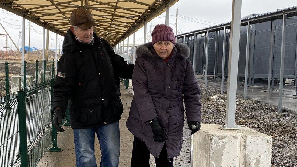 Leonid and Svitlana walking