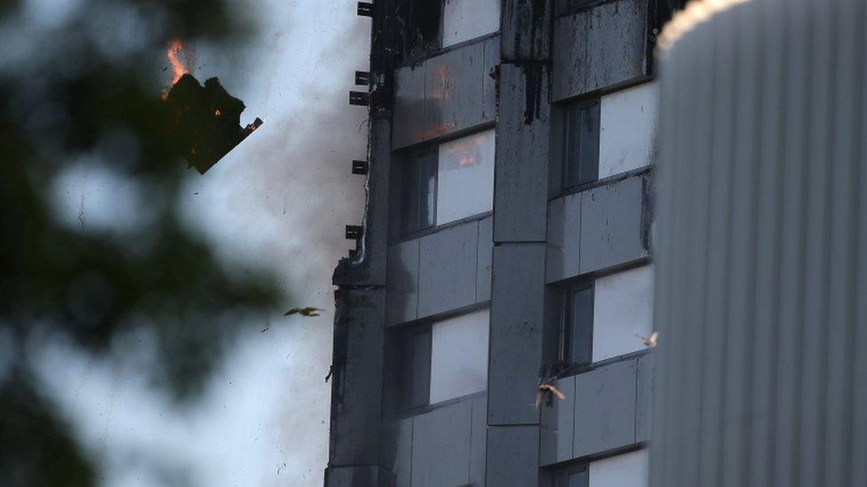 Debris falls from the fire