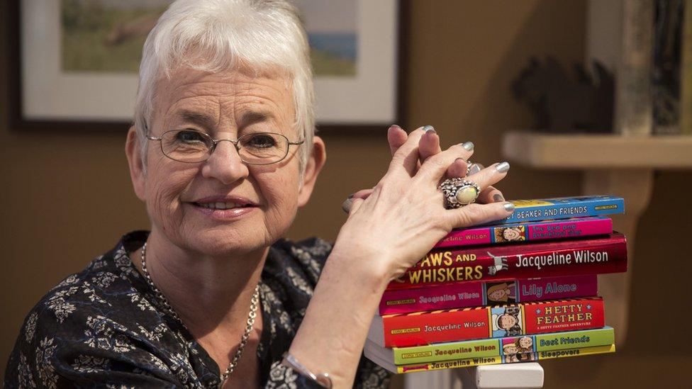 Jacqueline Wilson next to some of her books