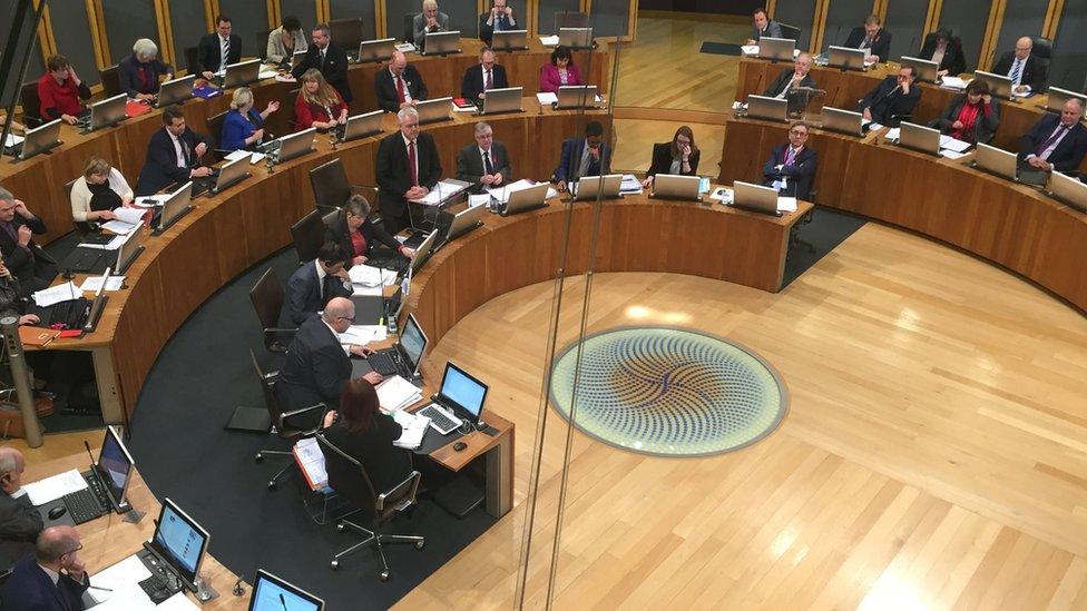 AMs in the Senedd chamber