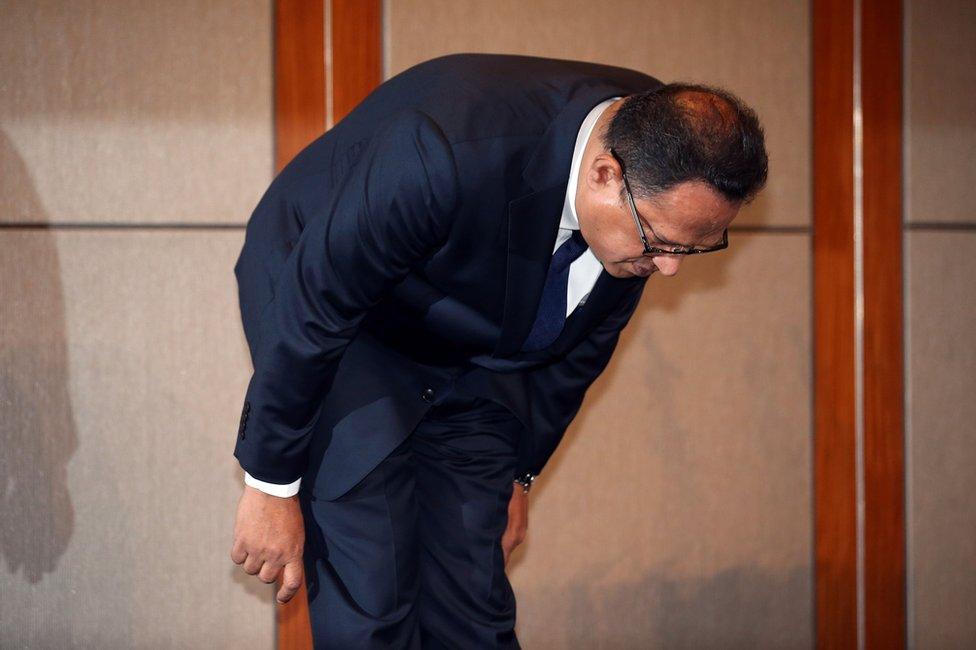 Atar Safdar, the head of Oxy Reckitt Benckiser Korea, bows during a press conference at a hotel in Seoul on May 2, 2016