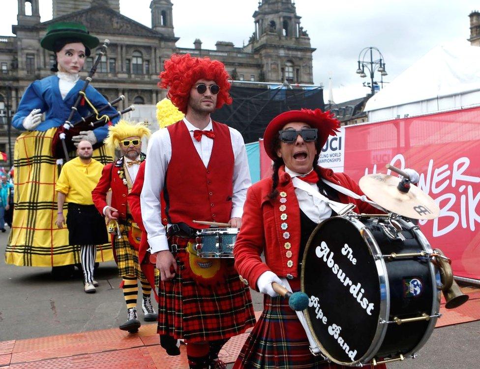 The Absurdist Pipe Band perform during the opening ceremony