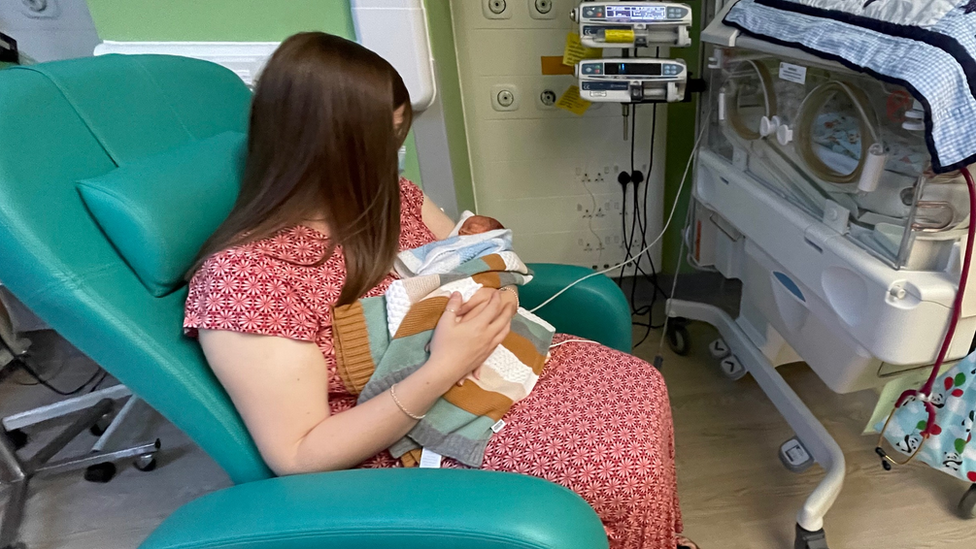 Mum and baby on neonatal ward