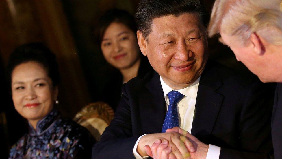 Chinese President Xi Jinping shakes hands with Donald Trump at the start of a summit at Trump"s Mar-a-Lago estate in West Palm Beach, Florida, April 6, 2017