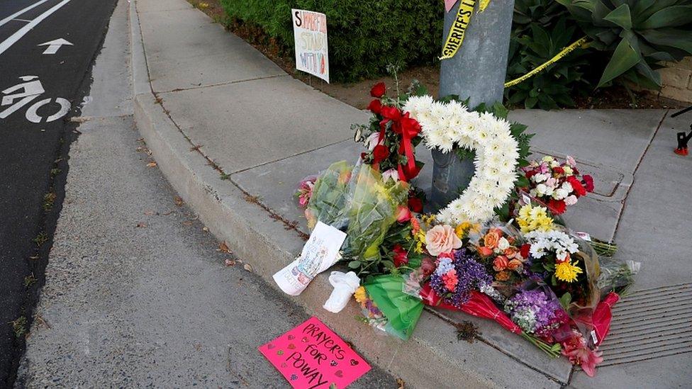 A makeshift memorial near a shooting where one person was killed at the synagogue in Poway, north of San Diego, April 27, 2019