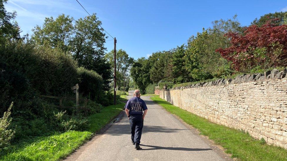 Darren walking down a country lane