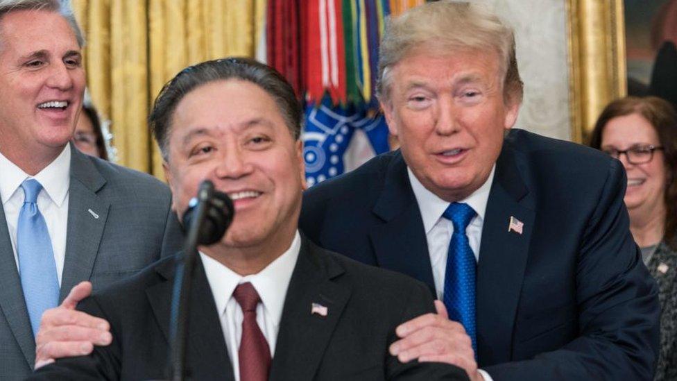 Broadcom boss Hock Tan and US President Donald Trump