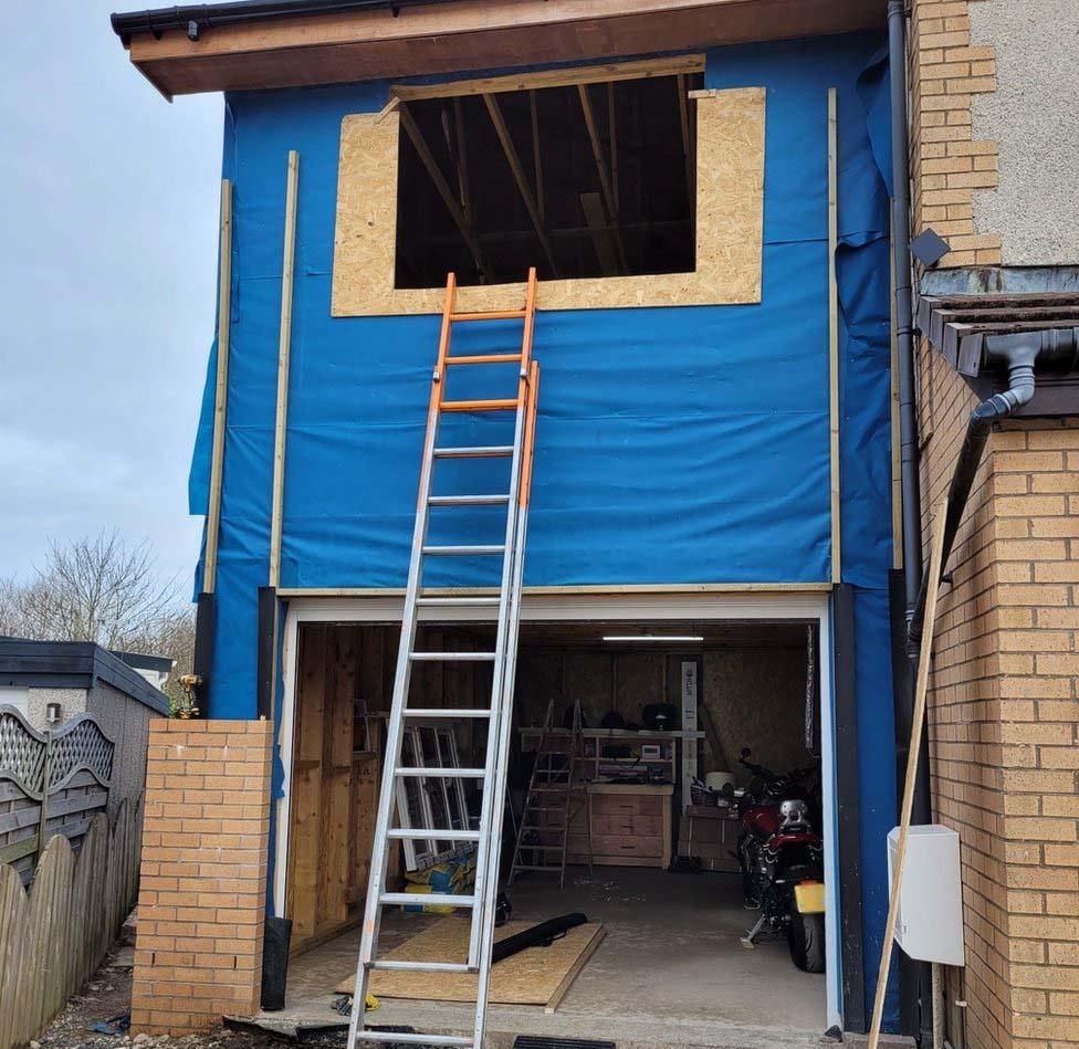 The Kilpatricks' extension was left with no tiles on the roof, no interior and was not watertight