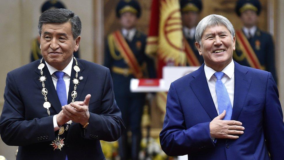 Kyrgyzstan President Soronbai Jeenbekov, left, with his predecessor Almazbek Atambayev