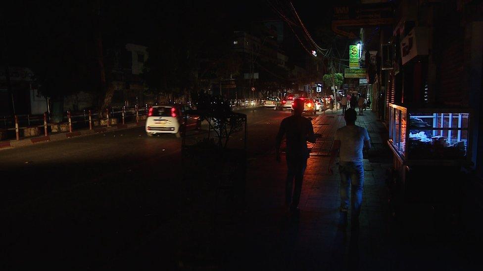 Unlit street in the Gaza Strip at night