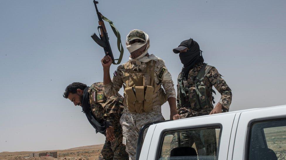 Iraqi PMF fighters on the Iraq-Syria border