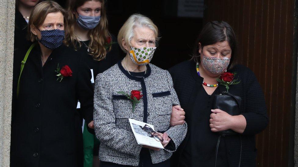 Pat Hume and her daughter Mo leaving the cathedral together.