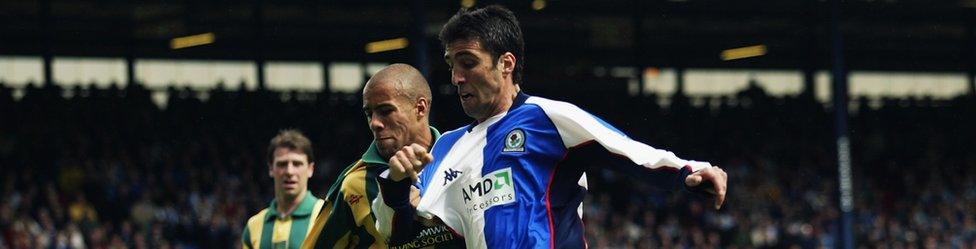 Hakan Sukur of Blackburn Rovers holds off James Chambers of West Bromwich Albion on May 3, 2003