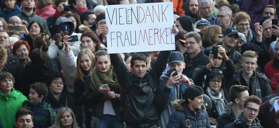 A man holds up a sign that reads: "Many thanks, Mrs. Merkel" at a CDU campaign rally ahead of Baden-Wuerttemberg state elections in Nuertingen, Germany (8 March 2016)