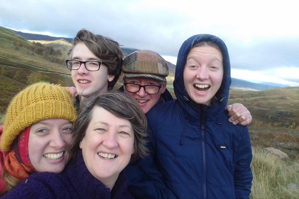 Jamie with his parents and cousins