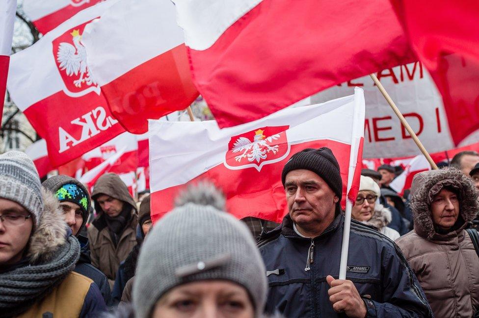 Conservative PiS supporters marching in Warsaw, 13 Dec 15