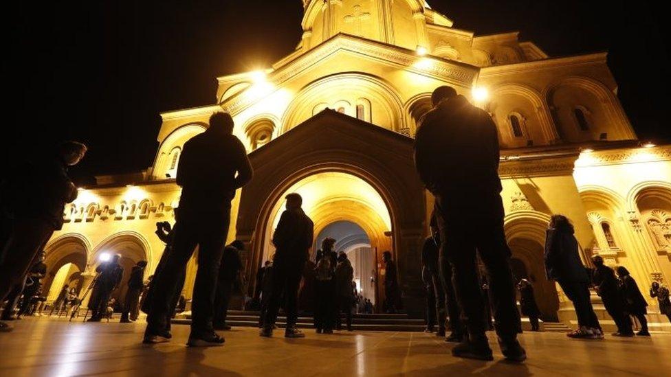 People attend Easter service at a cathedral in Tbilisi, Georgia. Photo: 18 April 2020