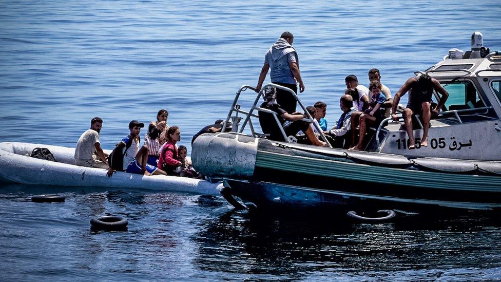 The Tunisian coast guard's speed boat seizes yet another vessel. This time an inflatable dinghy