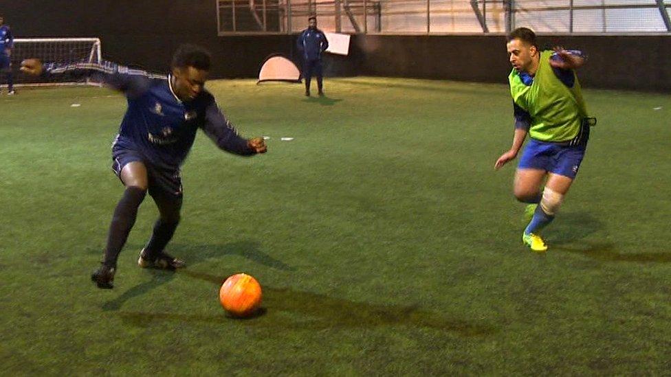 Refugees playing football