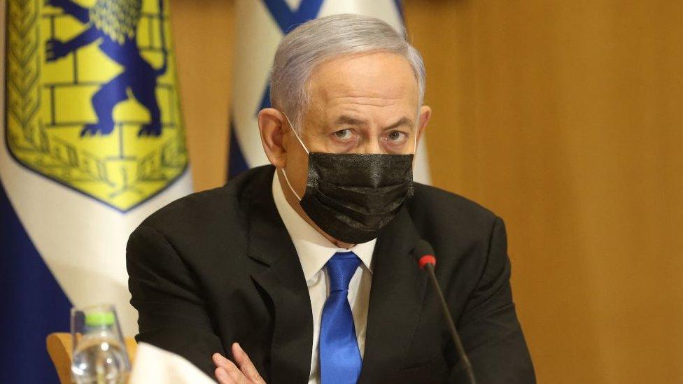 Israeli Prime Minister Benjamin Netanyahu, wearing a mask for protection against the COVID-19 pandemic, attends a special cabinet meeting on the occasion of "Jerusalem Day" at the city's municipality building on May 9, 2021