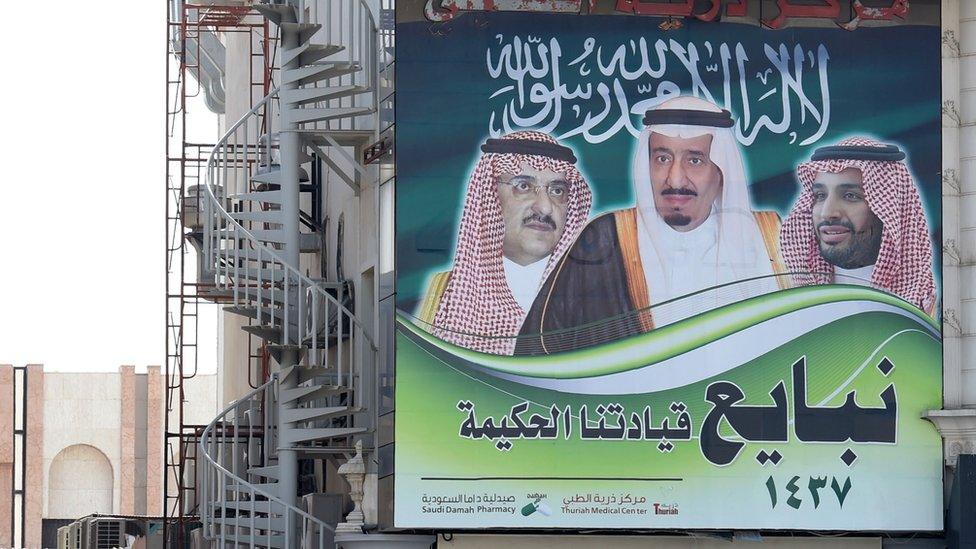 A picture taken on 17 January 2016 in the Saudi capital Riyadh shows a poster on a building showing Saudi King Salman (C), Crown Prince Mohammed Bin Nayef (L) and Deputy Crown Prince Mohammed Bin Salman