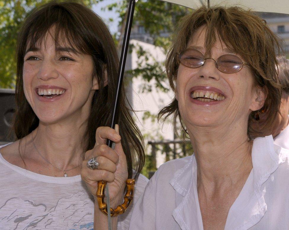 French actress Charlotte Gainsbourg (left), daughter of late French composer and singer Serge Gainsbourg, poses with her mother, British actress and singer Jane Birkin, the Serge Gainsbourg Garden in Paris on July 8, 2010.