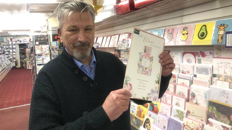 Shopkeeper Nigel Lambert in his card shop in March, Cambridgeshire