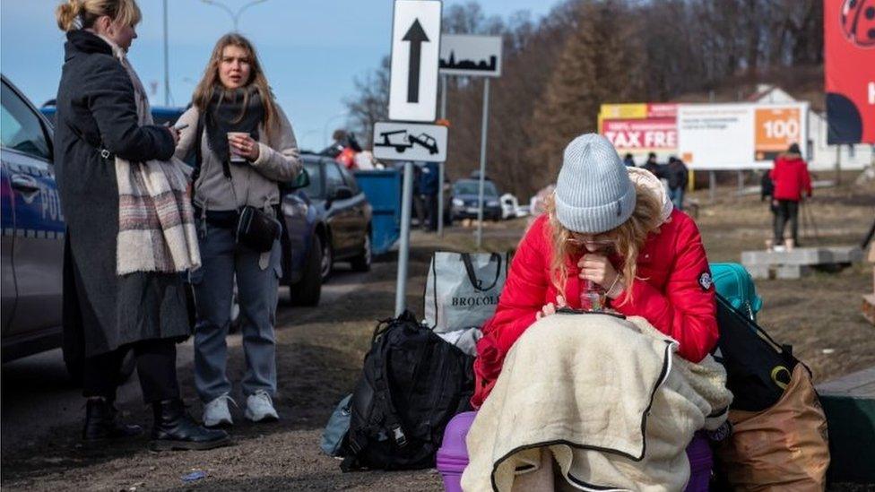 Ukrainian refugees near the Polish-Ukrainian border