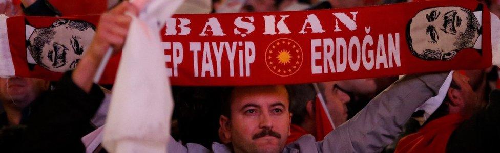 Supporters of Turkish President Erdogan celebrate as preliminary results of the constitutional referendum are announced in Ankara, Turkey