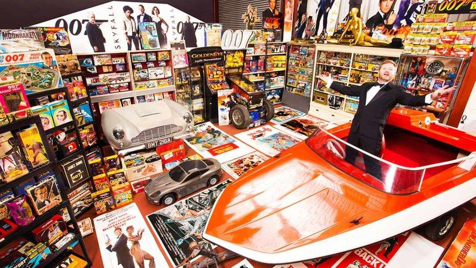 Nick Bennett with James Bond memorabilia collection