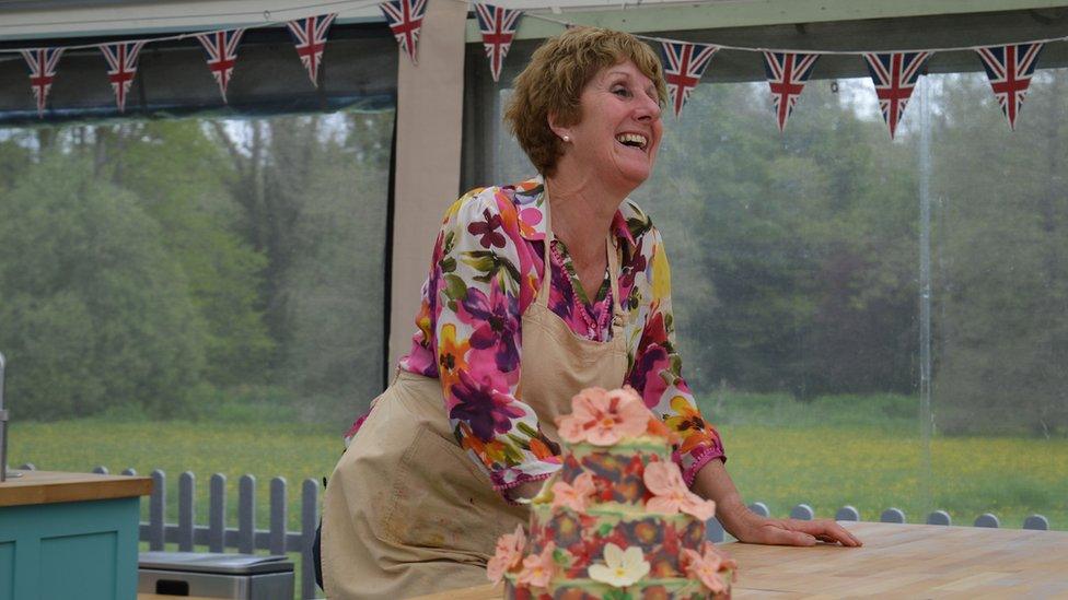 Jane with flowery cake