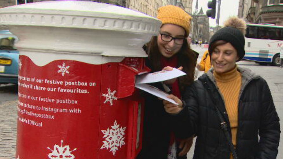 Women posting letters