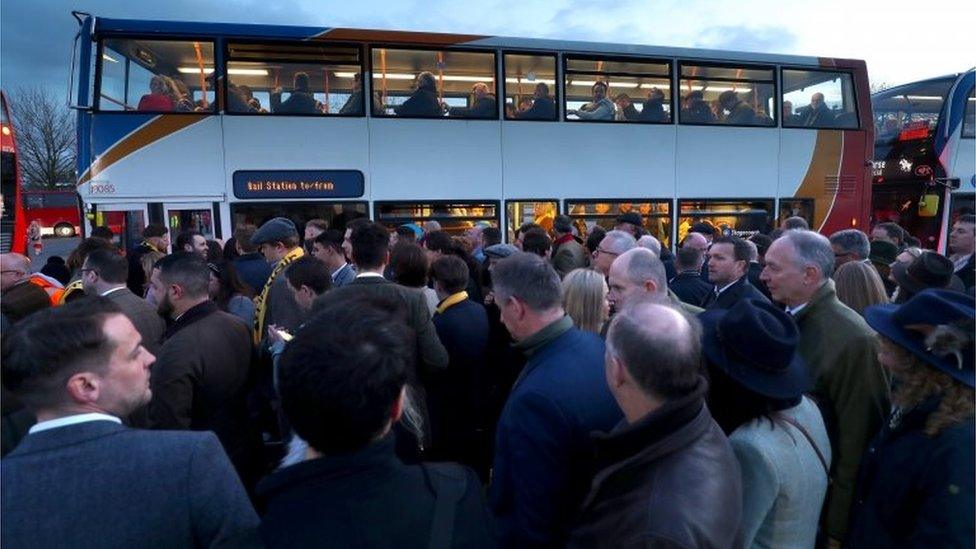 People using buses at the festival