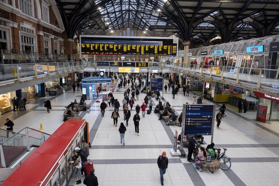 Interior of Liverpool Street train station busy with commuters on 10 January 2023