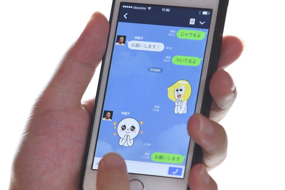 Line app is displayed on an Apple Inc. iPhone 5s on July 16, 2014 in Tokyo, Japan.