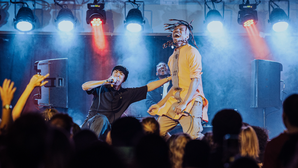 Asher Simmons and Benji performing together at the Bristol Beacon