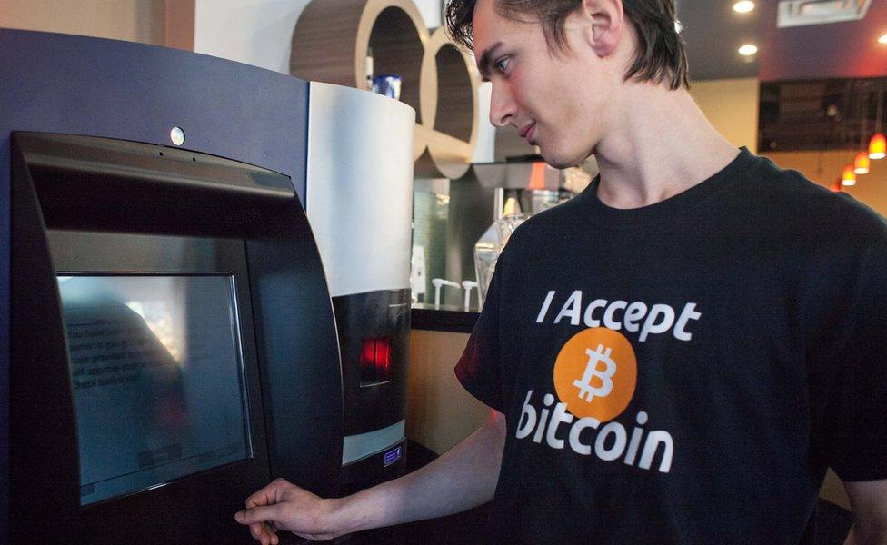 Man wearing "I accept Bitcoin" T-Shirt