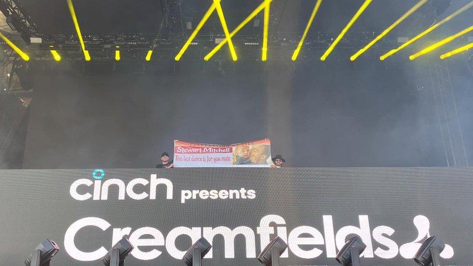 Banner on stage at Creamfields